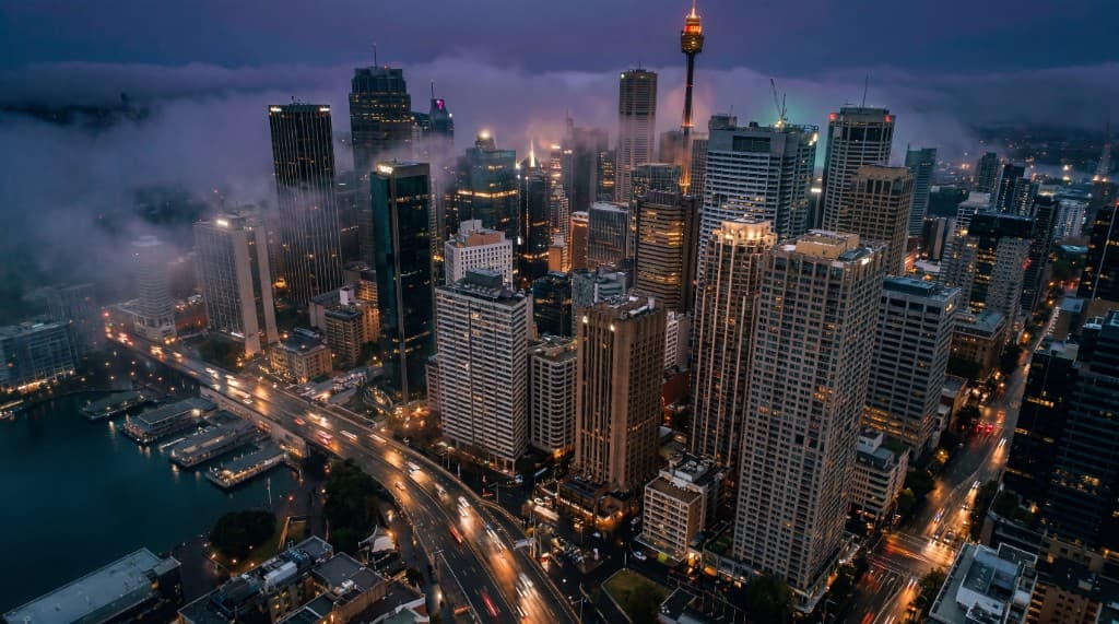 Sydney skyline at night with illuminated commercial buildings